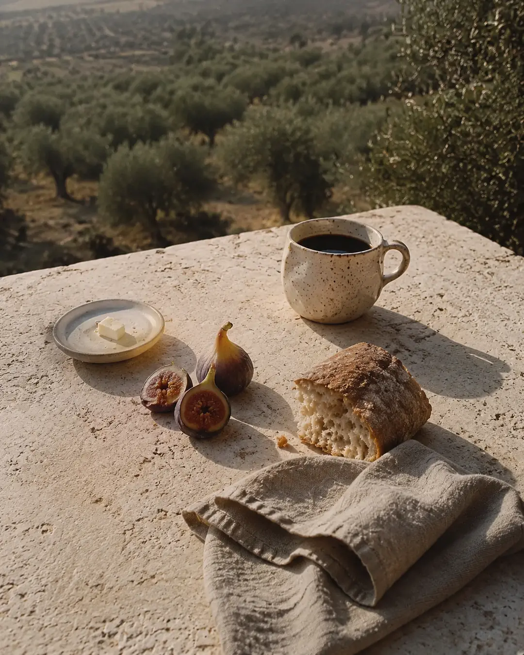 A simple Mediterranean breakfast arranged on a private terrace